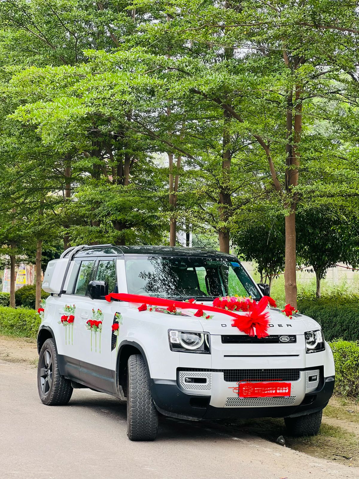 Landrover Defender, decorated as a wedding fleet.